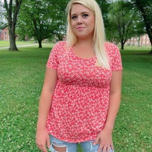 New w/ tags. Femme fountain red floral baby doll top.